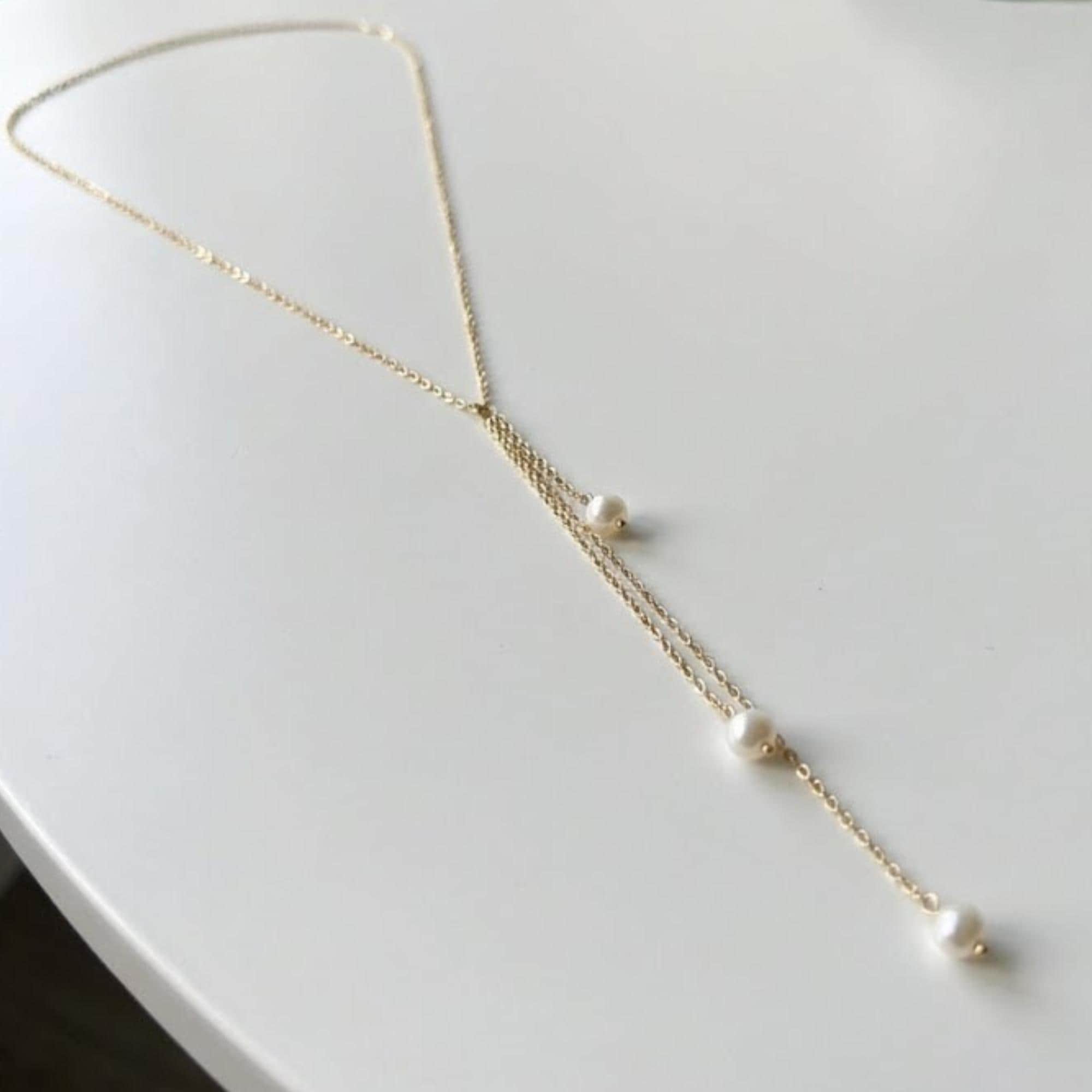 Pearl Lariat Backdrop — Gold Tone