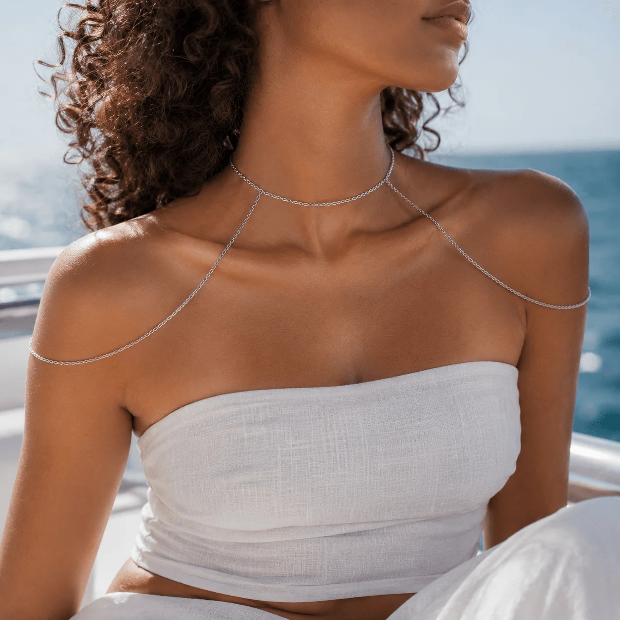 Handcrafted silver stainless steel shoulder harness for evening wear, elegant body chain jewelry accent