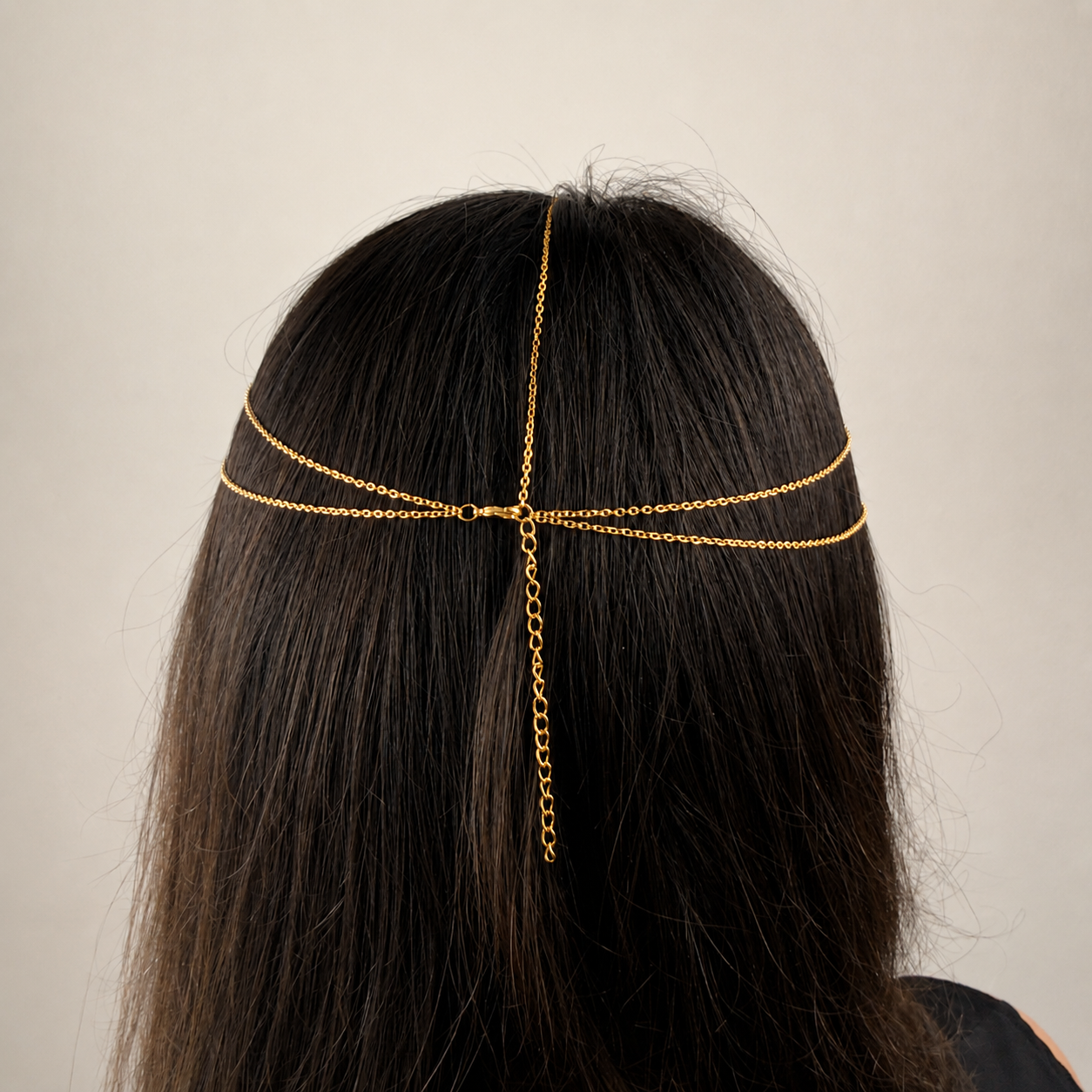 Delicate gold-tone stainless steel bridal forehead chain draped across hairline for romantic wedding headpiece styling