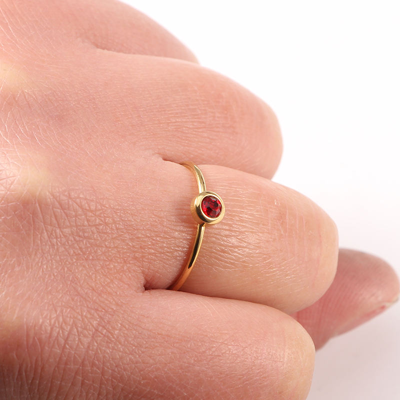 Dainty gold birthstone ring with cubic zirconia stone, stainless steel stacking ring available in 12 birthstone colors, US size 6