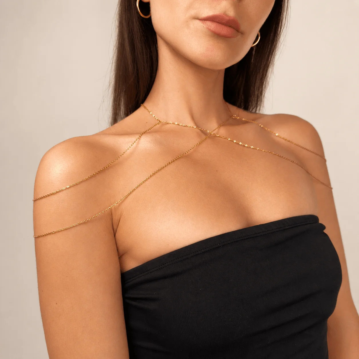 Elegant gold tone stainless steel goddess shoulder chain for special occasion jewelry and statement evening wear