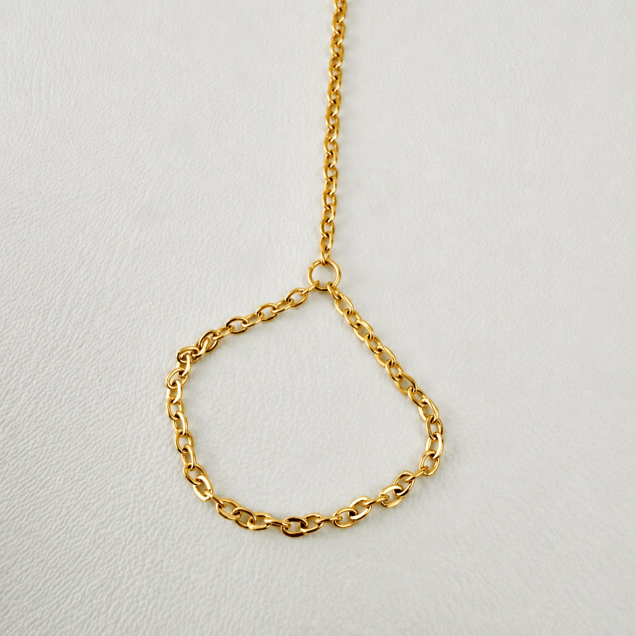 Delicate gold tone stainless steel barefoot sandal ankle bracelet for beach weddings and summer barefoot jewelry styling.