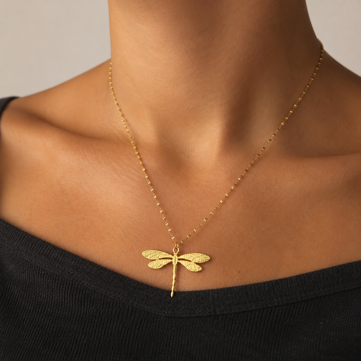 Gold and silver stainless steel mirror-link chain necklace with detailed dragonfly charm pendant