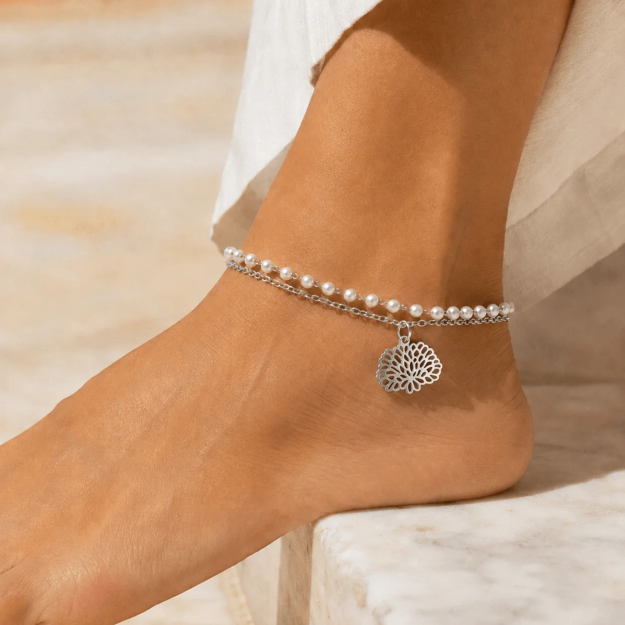 Delicate birth flower gold tone stainless steel ankle bracelet for everyday wear and beach occasions