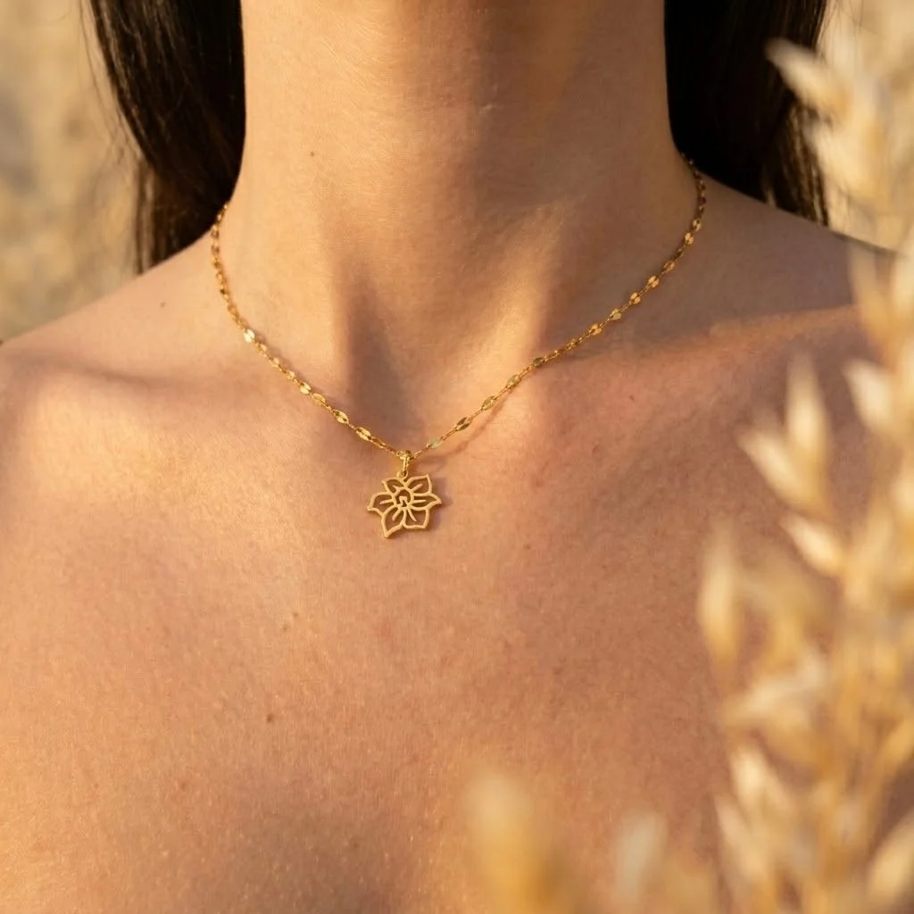 Delicate gold tone birth flower charm necklace in stainless steel, handcrafted dainty necklace for meaningful everyday wear