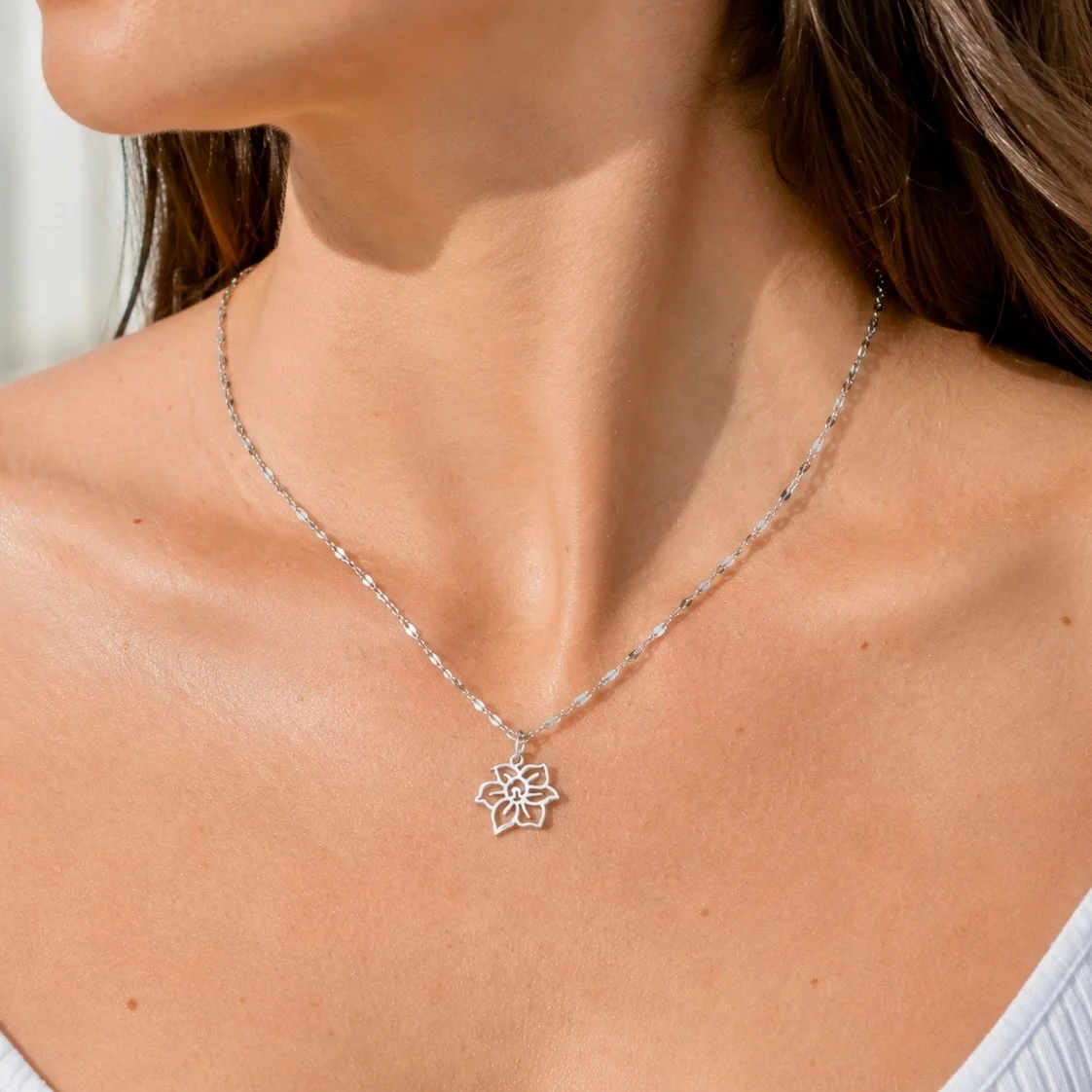 Delicate gold tone birth flower charm necklace in stainless steel, handcrafted dainty necklace for meaningful everyday wear