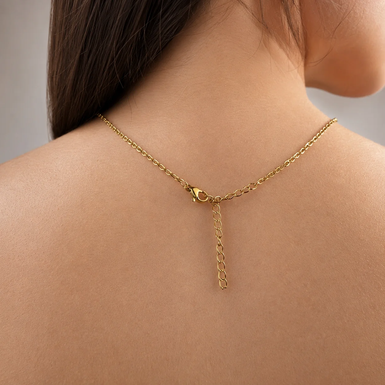 Delicate gold-tone birth month teardrop choker necklace with gemstone pendant, stainless steel waterproof design