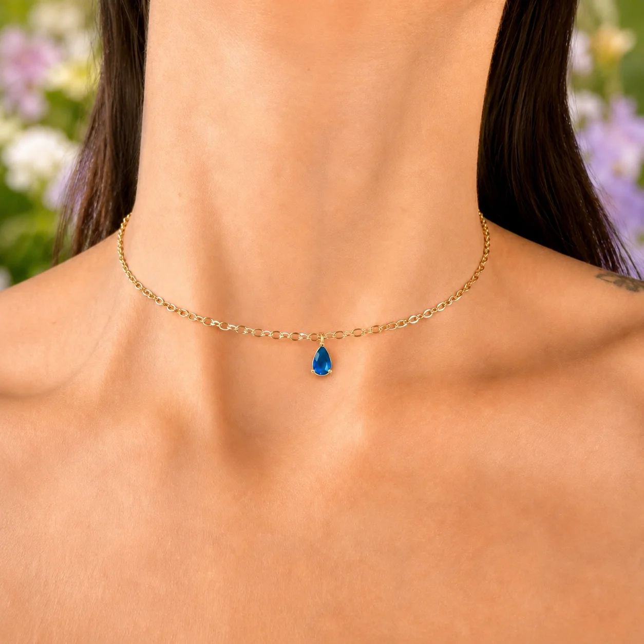 Delicate gold-tone birth month teardrop choker necklace with gemstone pendant, stainless steel waterproof design