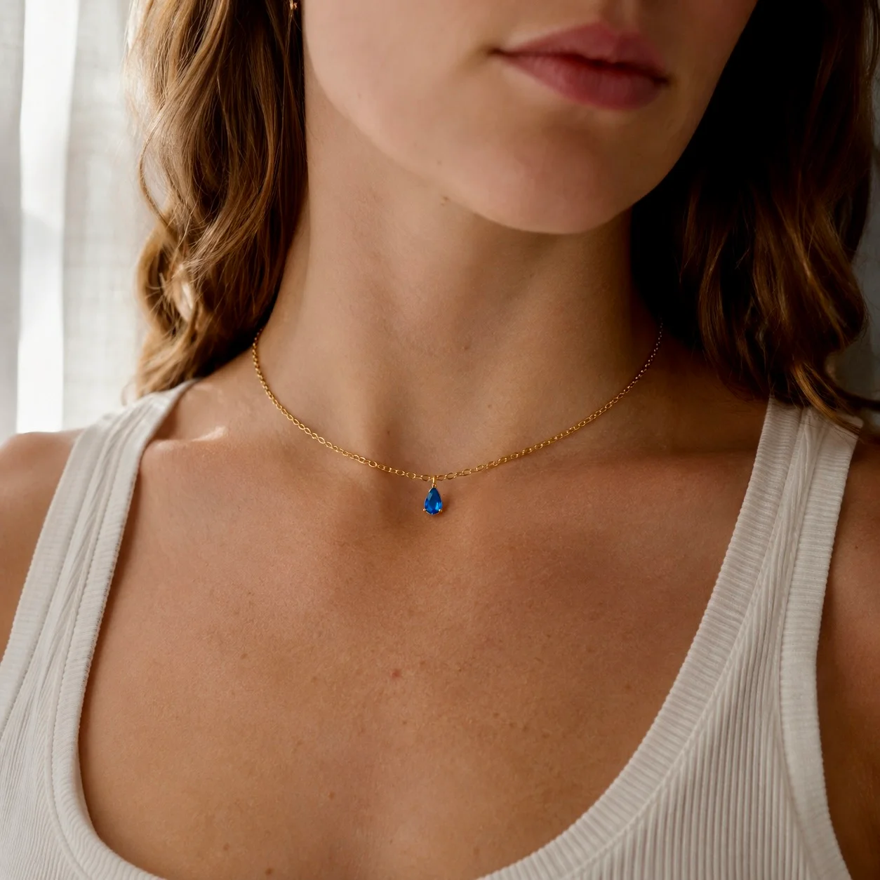 Delicate gold-tone birth month teardrop choker necklace with gemstone pendant, stainless steel waterproof design