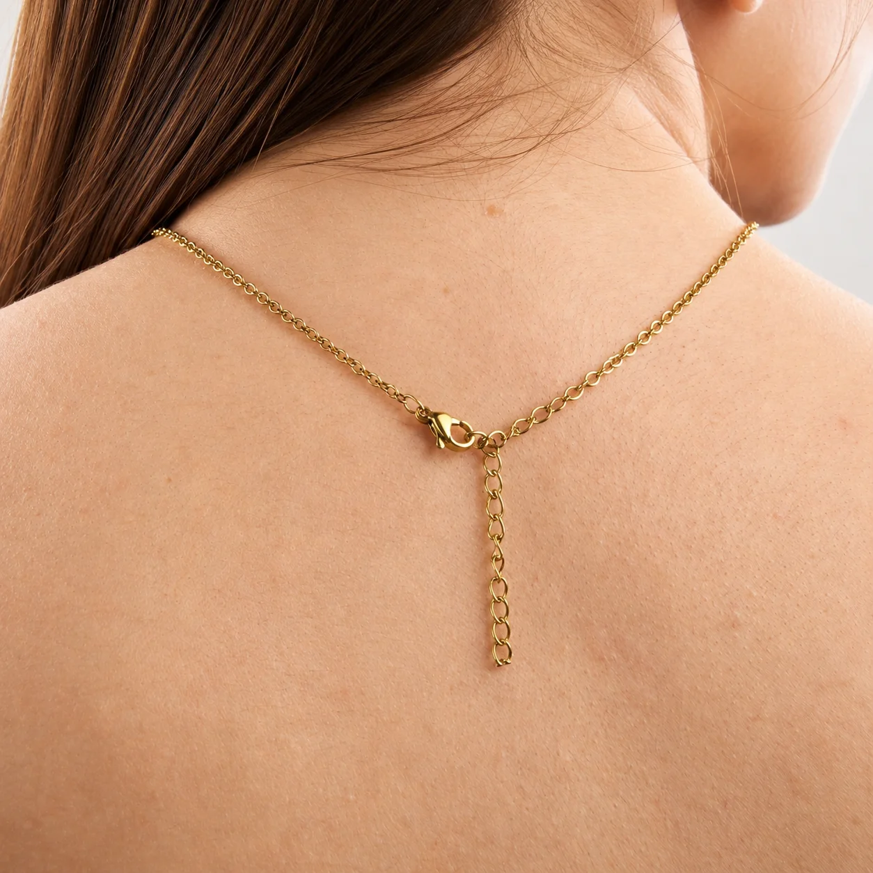Delicate gold-tone birth month teardrop choker necklace with gemstone pendant, stainless steel waterproof design