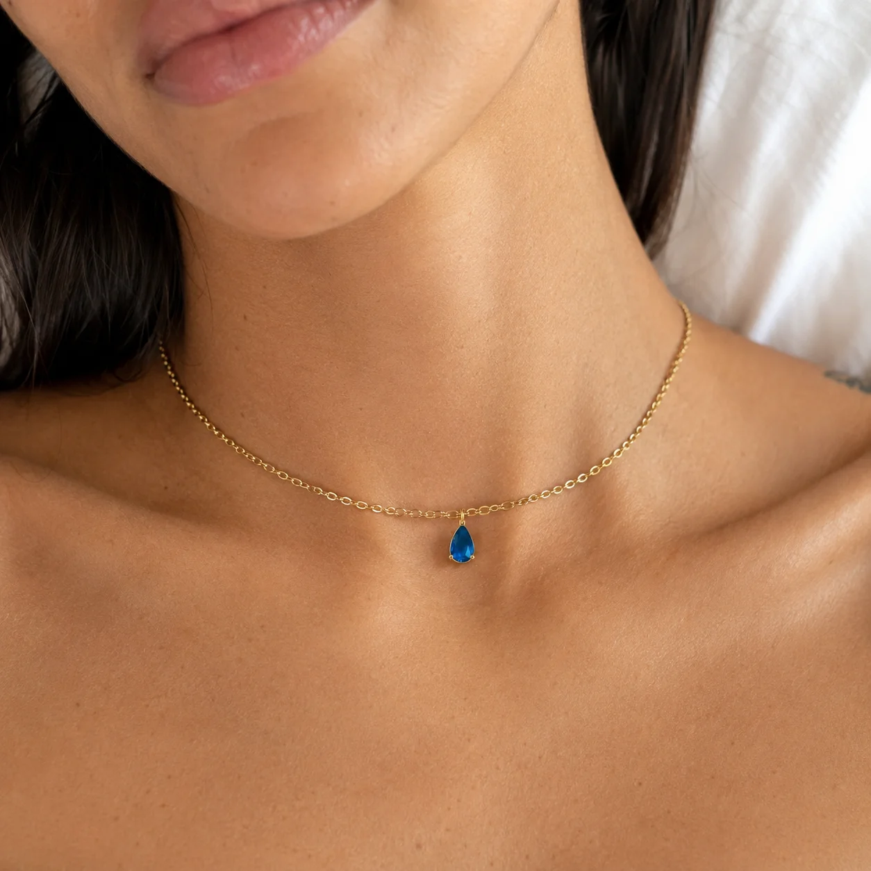 Delicate gold-tone birth month teardrop choker necklace with gemstone pendant, stainless steel waterproof design
