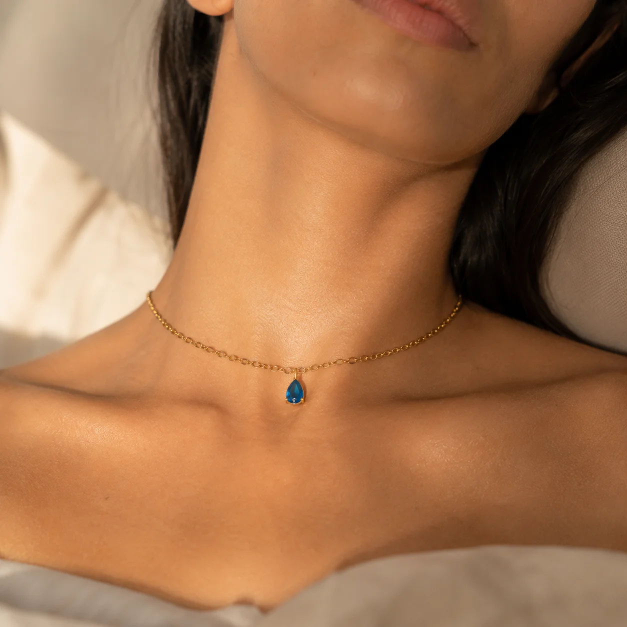 Delicate gold-tone birth month teardrop choker necklace with gemstone pendant, stainless steel waterproof design