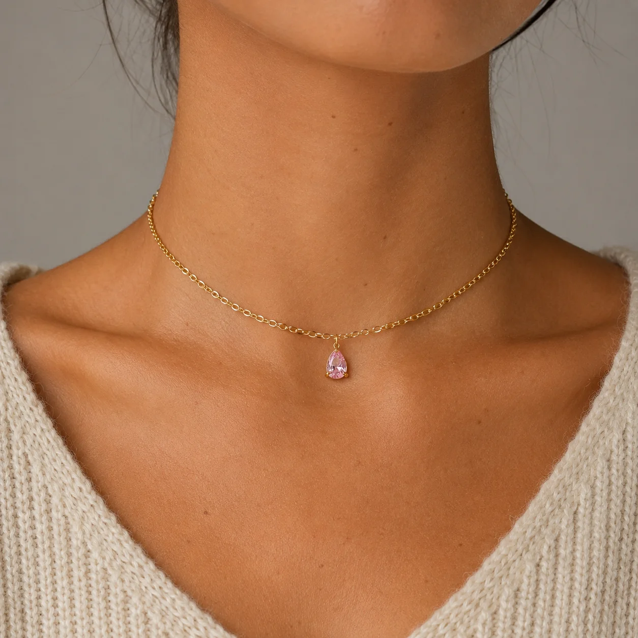Delicate gold-tone birth month teardrop choker necklace with gemstone pendant, stainless steel waterproof design