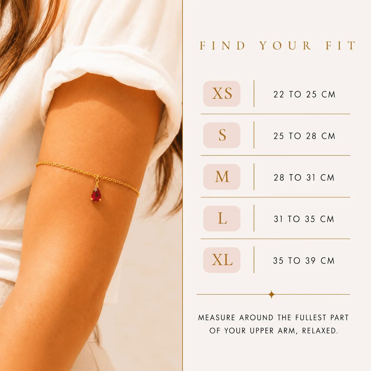 Dainty single-strand gold stainless steel birthstone arm band with teardrop gemstone, waterproof upper arm jewelry