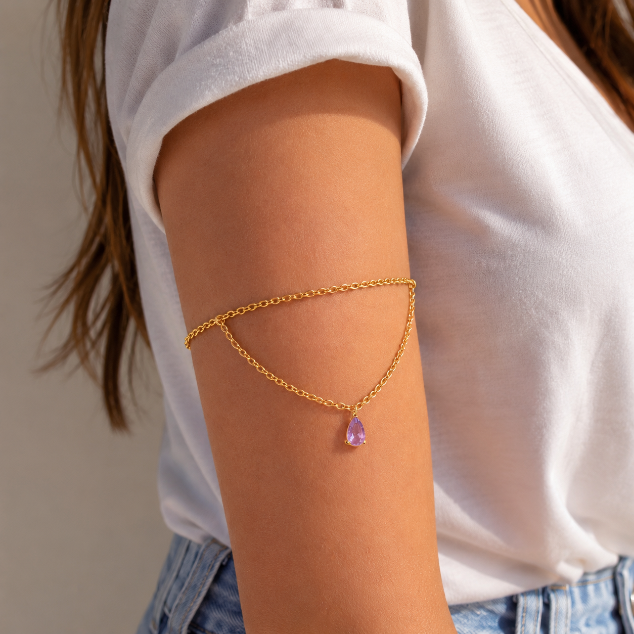 Gold birthstone arm chain with teardrop gemstone pendant — personalized upper arm cuff in stainless steel for beach, wedding, and everyday wear