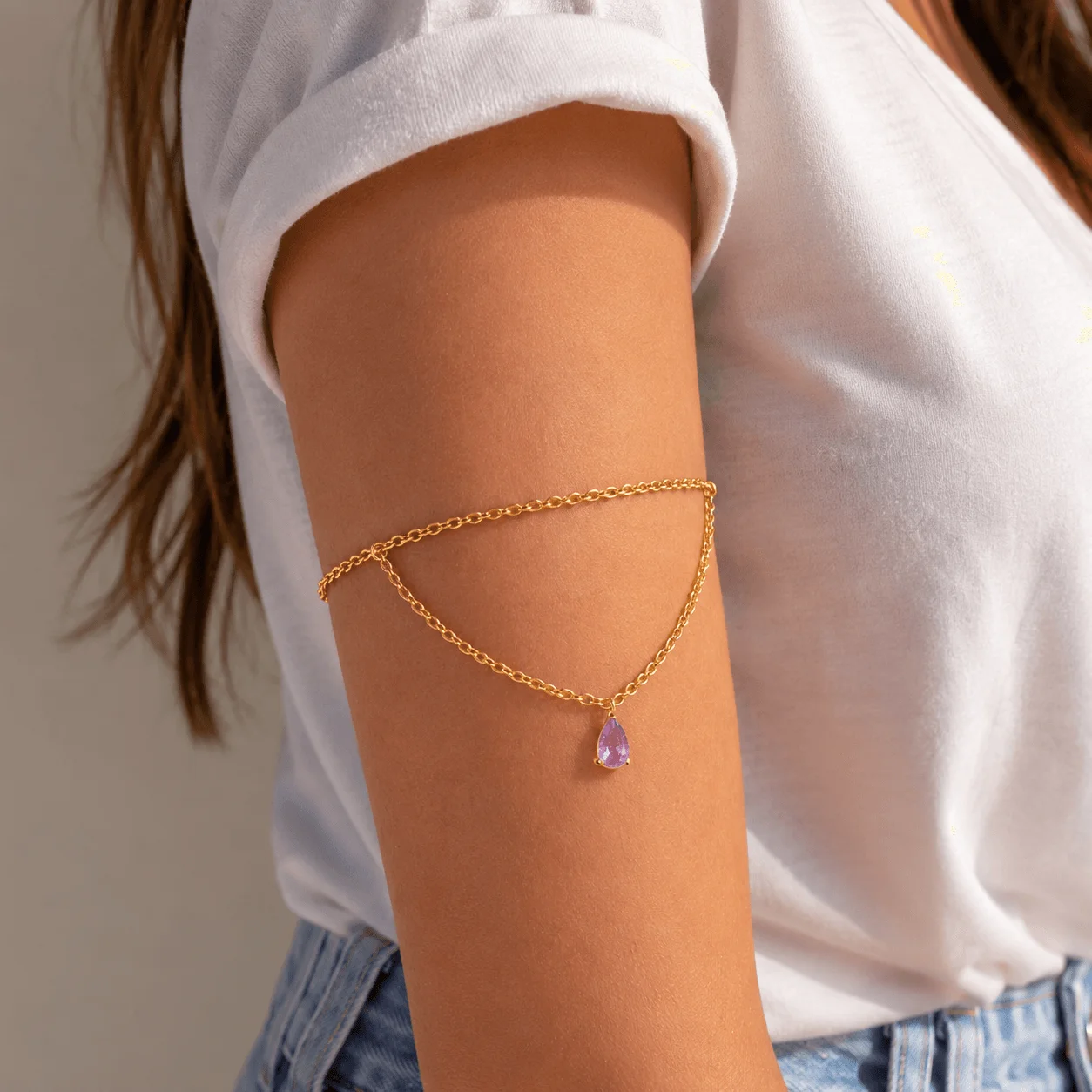 Dainty gold stainless steel birthstone arm chain with teardrop gemstone for waterproof shoulder jewelry