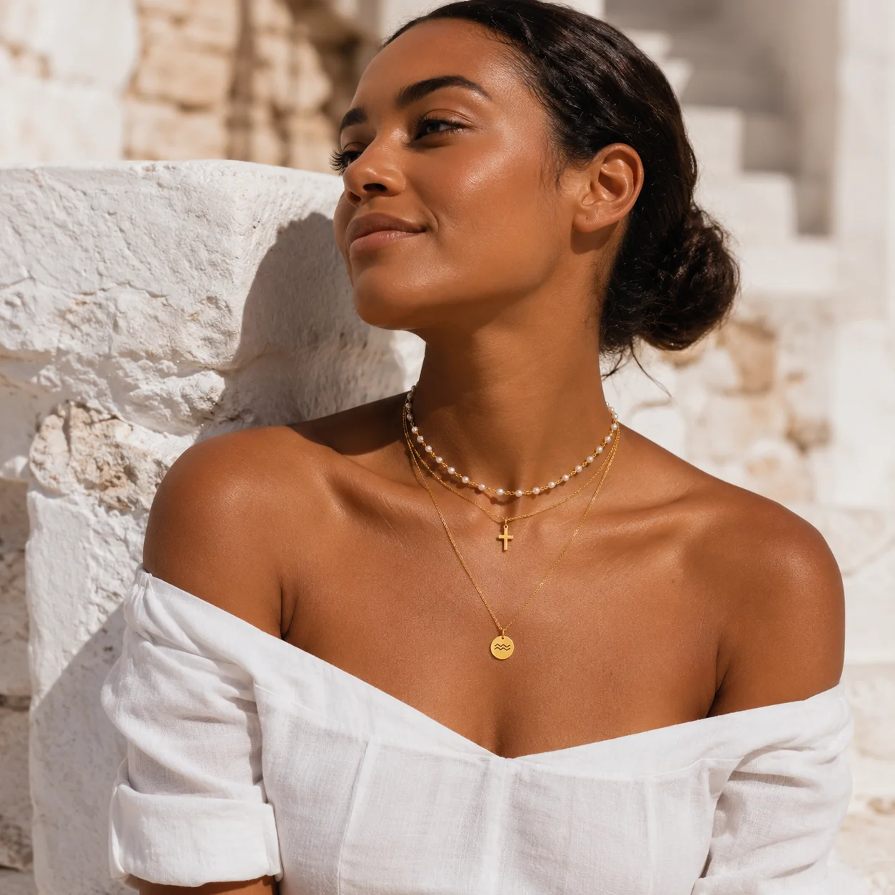 Layered necklace set with faux pearl choker, cross pendant chain, and zodiac pendant necklace in waterproof gold or silver stainless steel