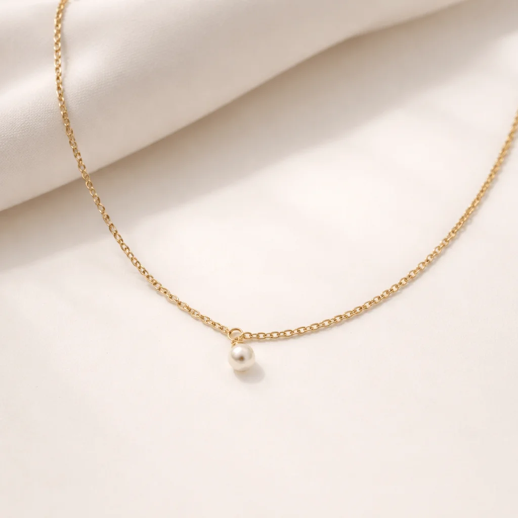 Minimalist pearl back body chain in gold stainless steel, elegant open-back necklace for sophisticated styling