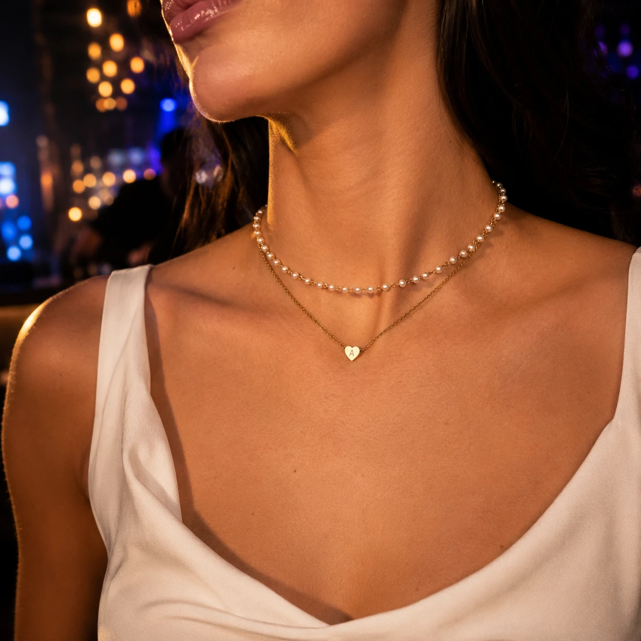 Personalized initial heart pendant necklace layered with pearl bead chain, gold-tone stainless steel choker