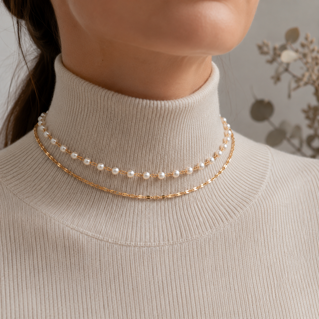 Dainty pearl bead choker necklace layered with a fine gold-tone or silver-tone cable chain in waterproof stainless steel