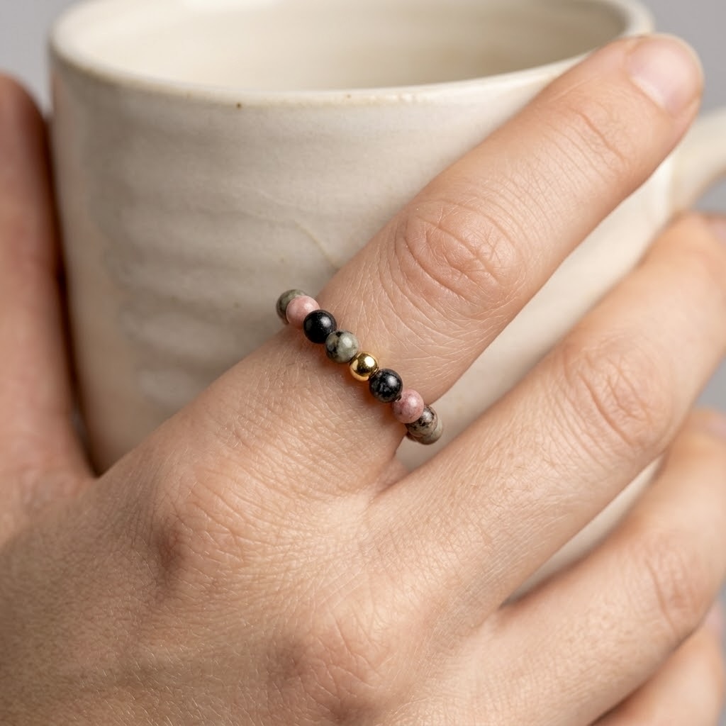Rhodochrosite natural stone beaded stretch ring with gold stainless steel accent bead